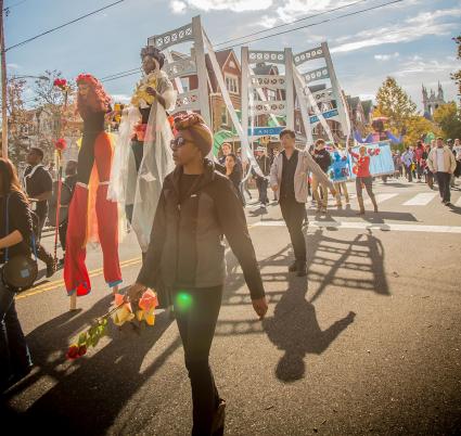 People and puppets march in SpiralQ's Peoplehood event