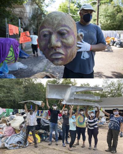 Volunteers hold up materials that survived the flood!